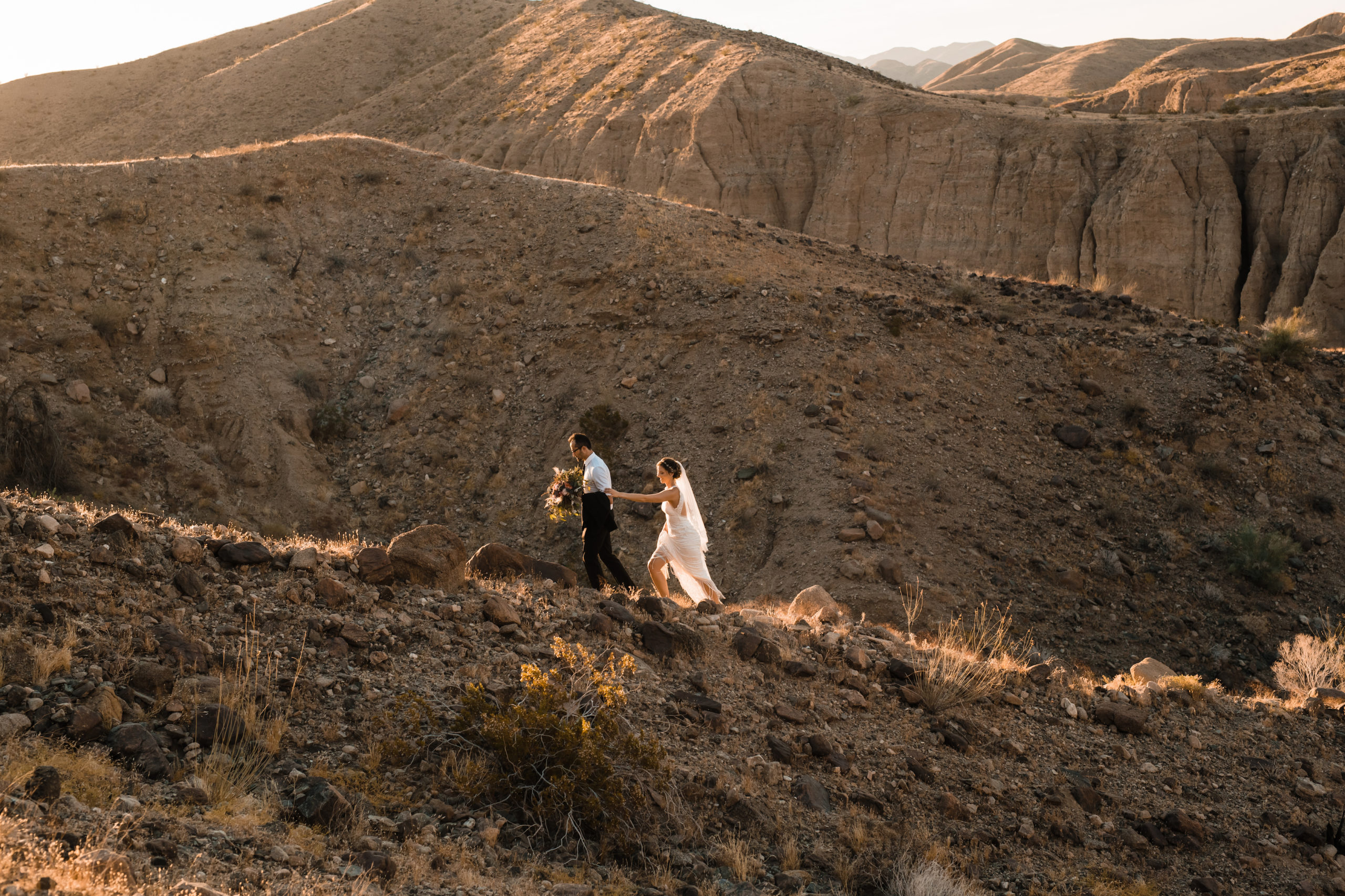 Bride and groom hike in Palm Springs